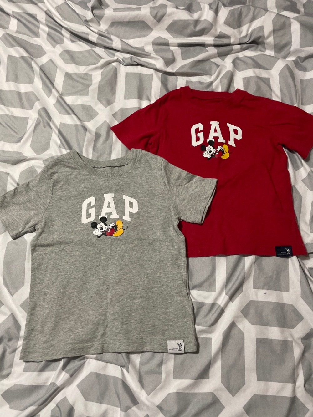 2 mickey mouse shirts